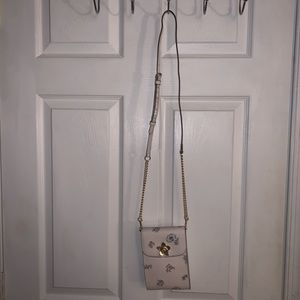 Cream Coach crossbody bag
